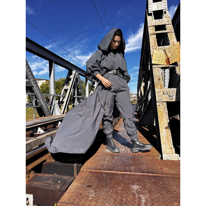 Black cargo-gothic-chic ensemble with a voluminous cape and cargo pockets