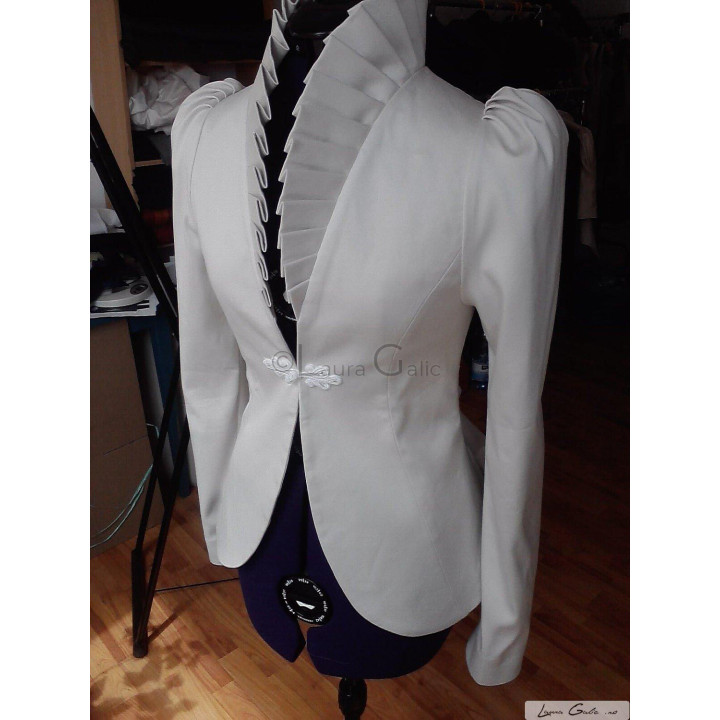 White Celia jacket with long sleeves, a fitted waist and decorative front clasp