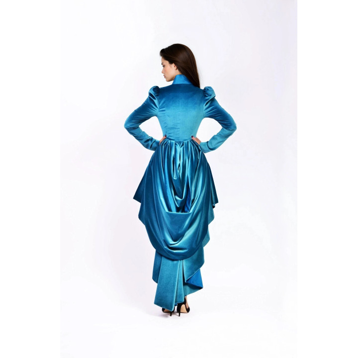 Back of the Ofelia Haute Couture coat showing its voluminous folded drape and extended hem