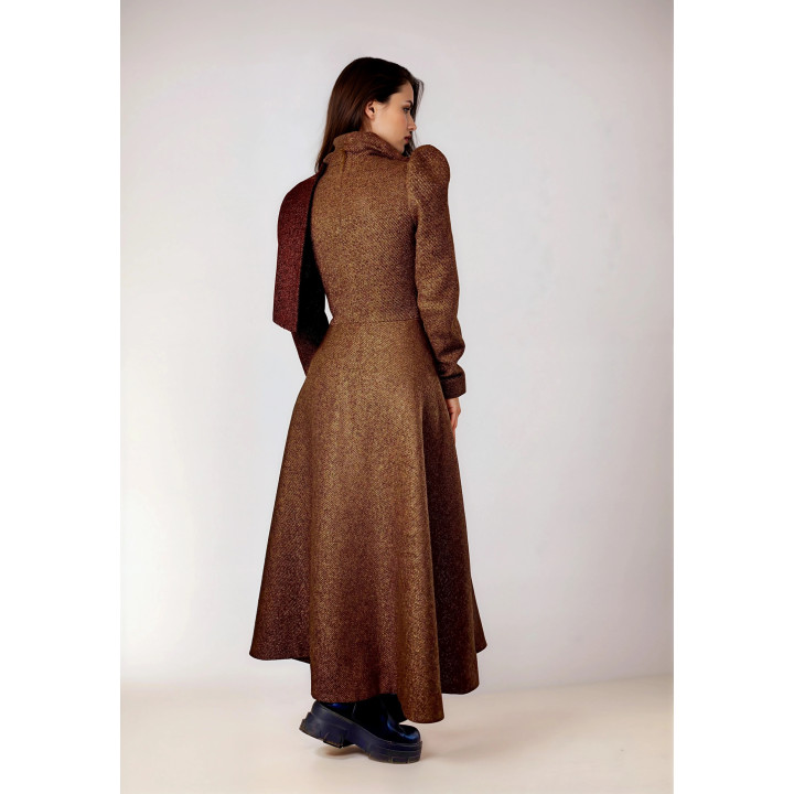Back view of the Beatrice 3 coat showing its defined waist and flared skirt