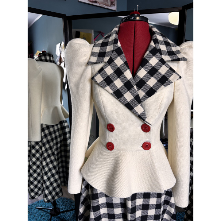 Close-up of the Carmen jacket's checked lapels and four red buttons