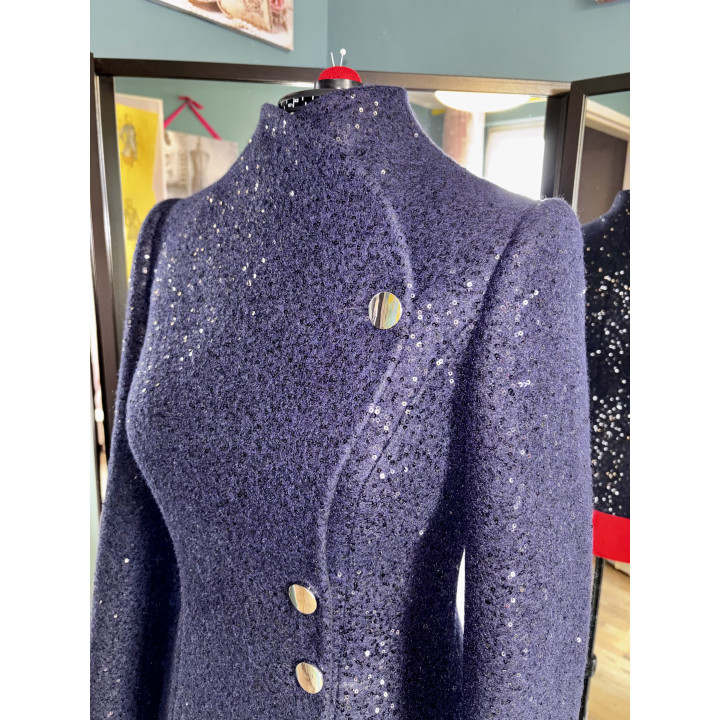 Front of the Luca short coat showing its high collar and button fastening