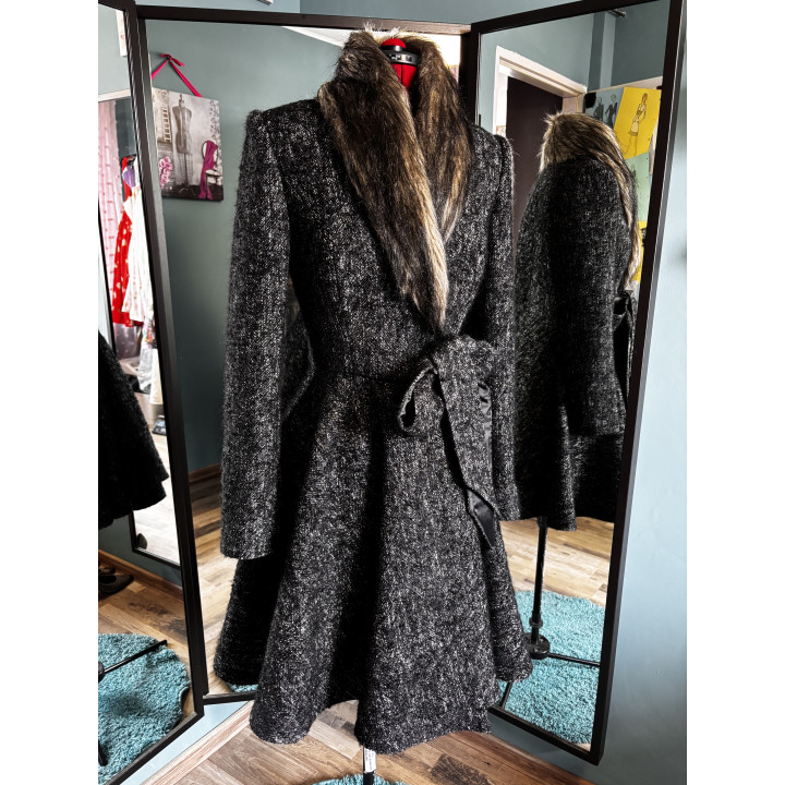 Gaia 2 wool coat showing the faux fur collar and adjustable waist belt