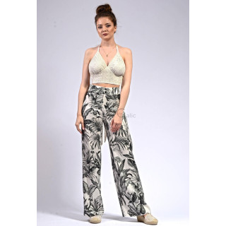 Ursula wide-leg trousers with a black-and-white botanical print, shown from the front