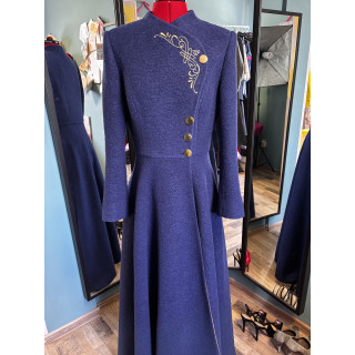 Tamura deep blue coat with a long fitted silhouette, gold embroidery and decorative buttons