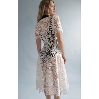 Back view of the Lysandra white lace dress with floral motifs
